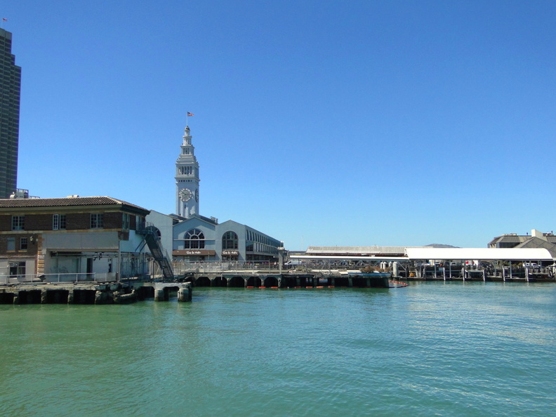 A scenic view of the Ferry Building in San Francisco, with a clear blue sky and a bustling waterfront. DSC08526.JPG