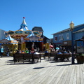Busy Boardwalk with Amusement Rides