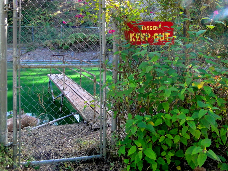 Entrance to a Wildlife Reserve with Warning Signage