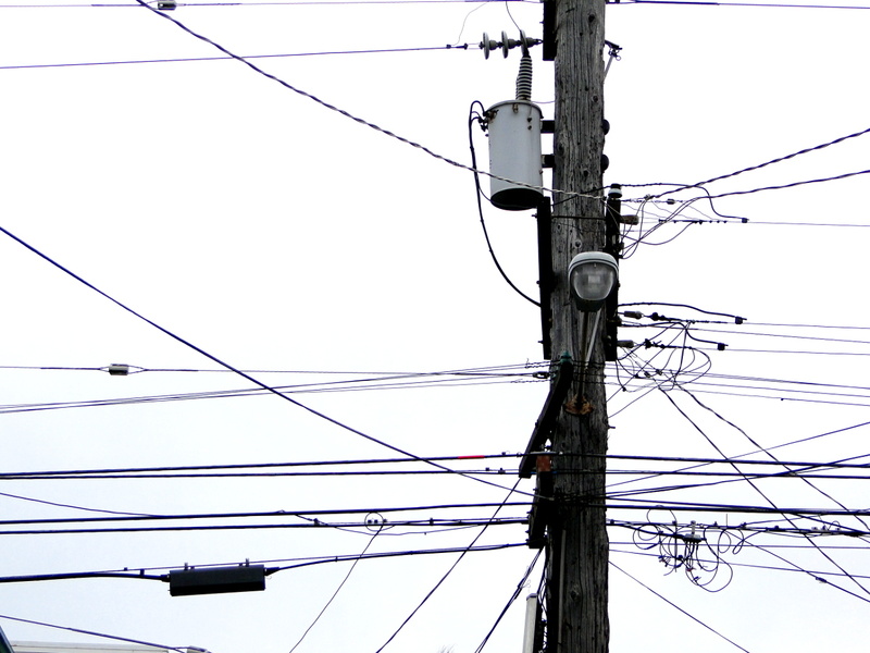 Urban Infrastructure: A Close-Up View of Power Lines and Poles in San Francisco, USA