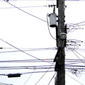 Urban Infrastructure: A Close-Up View of Power Lines and Poles in San Francisco, USA