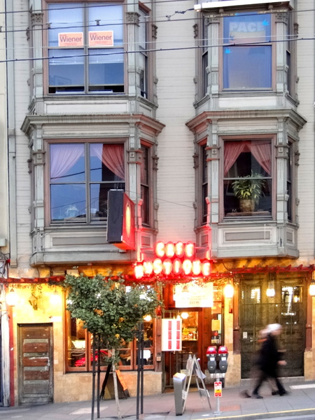 Vibrant San Francisco Storefront with a Neon Sign at Night
