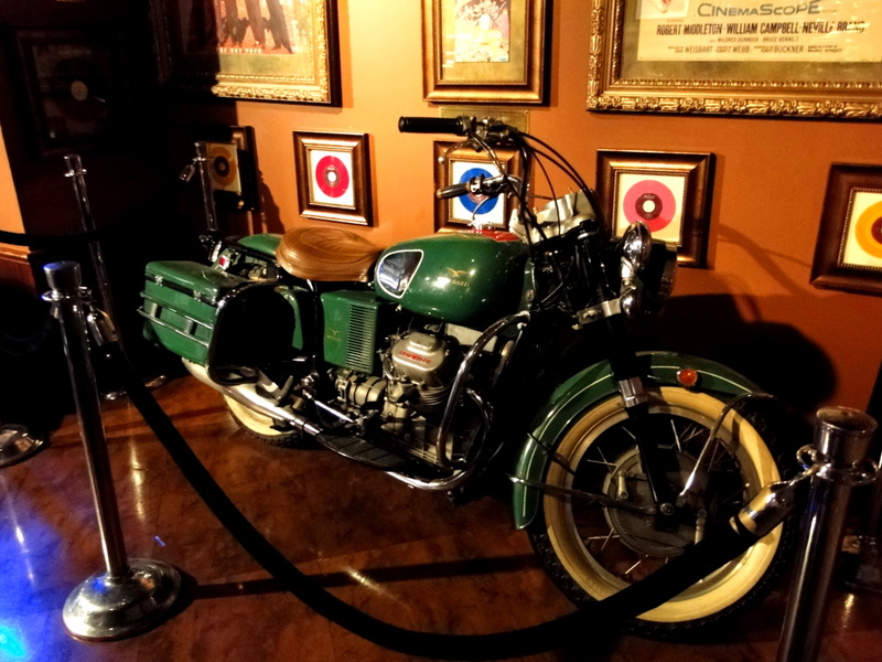 Vintage Green and White Motorcycle Display