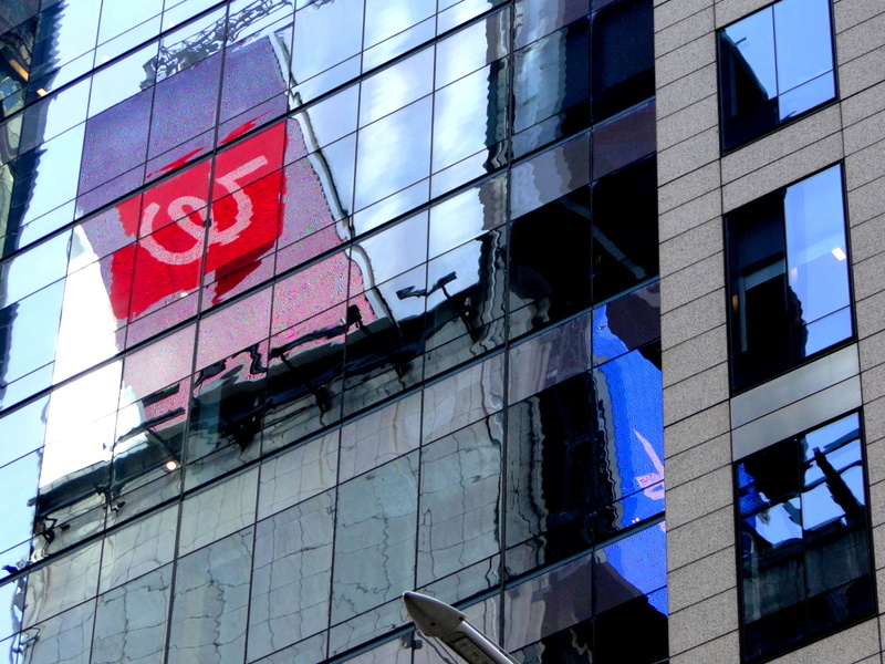 Reflections on a Glass Skyscraper in New York City