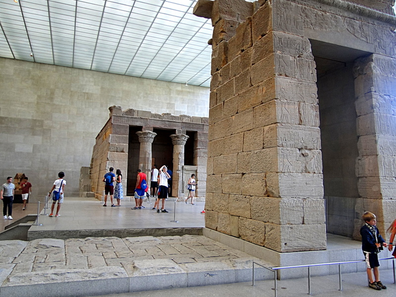 Tourists Exploring Ancient Greek Ruins