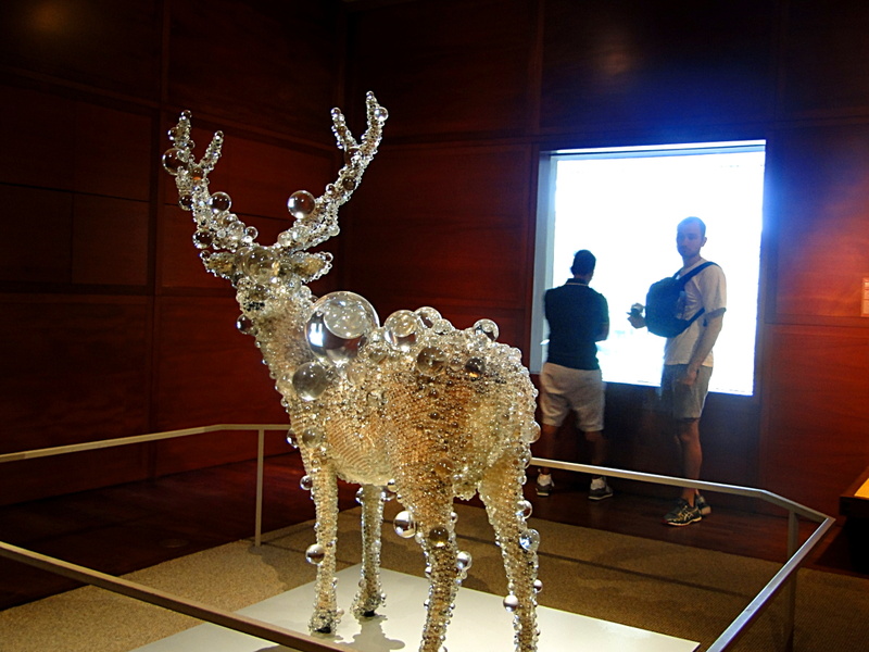 Metal Deer Sculpture with Glass Beads in Museum Display