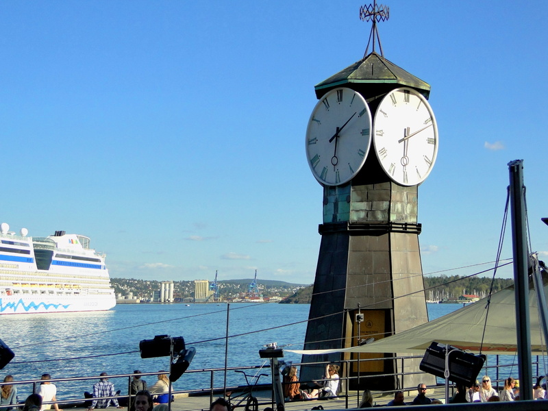 A Voyage in Time: The Oslo Clock Tower and Cruise Ship