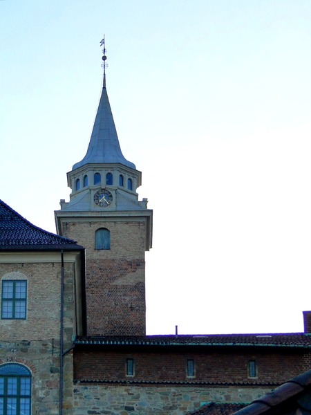 Oslo's Timeless Tower Under the Clouds