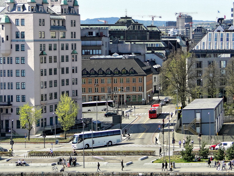 Vibrant Oslo Street Scene with Bus in Motion