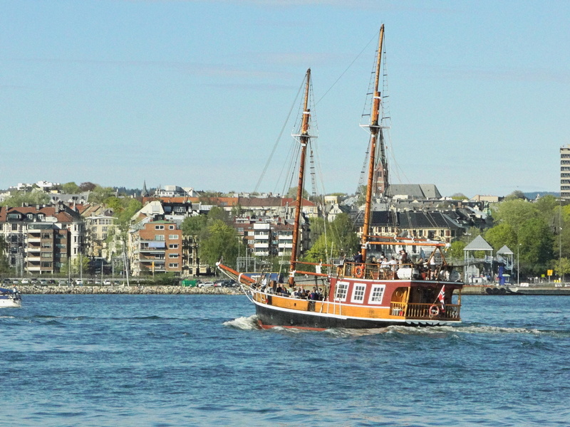 Maritime Heritage: A Vintage Sailboat Cruises on a River
