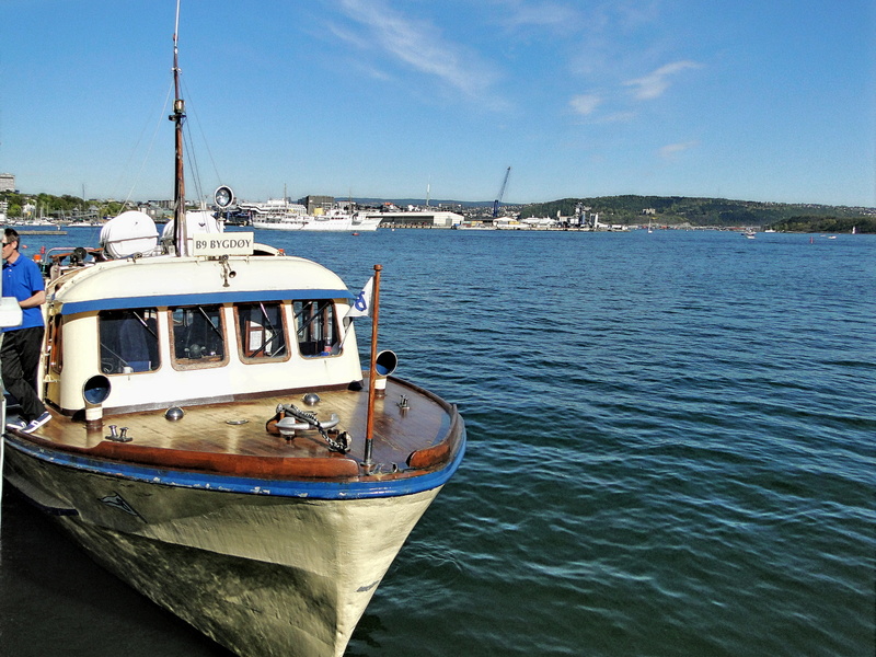 Rustic Boat Docked in a Serene Harbor