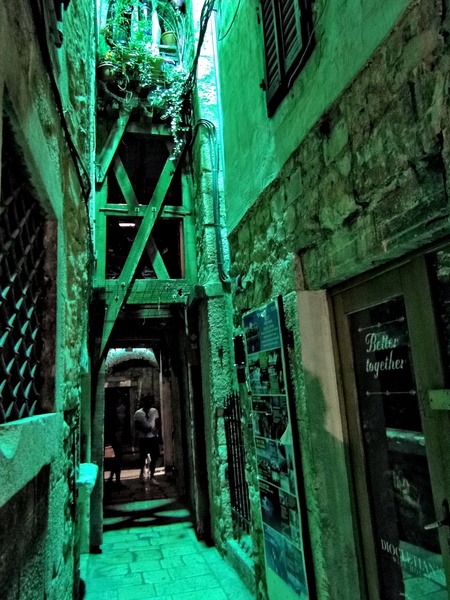 Narrow, Illuminated Alleyway