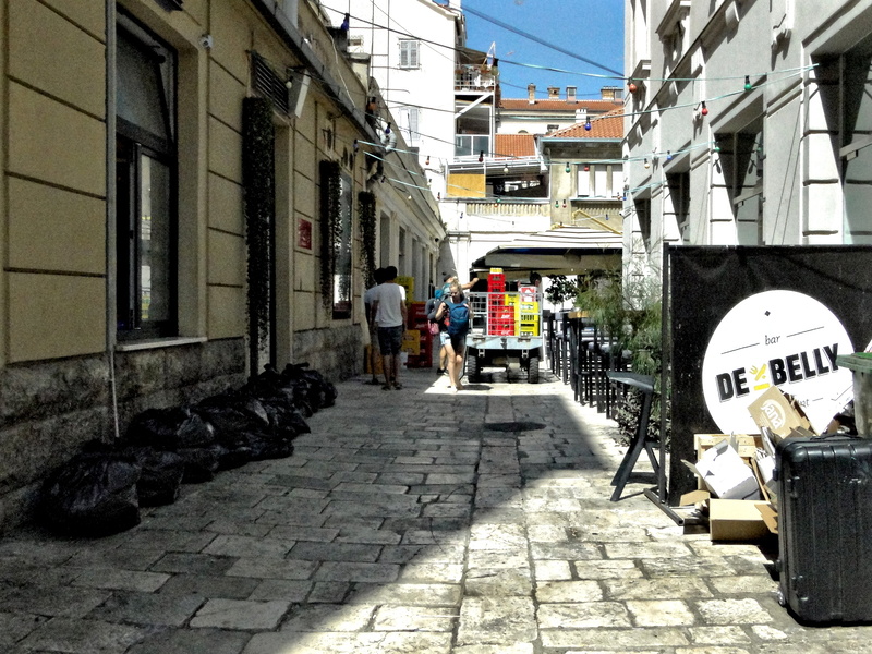 Narrow Alleyway in a European City