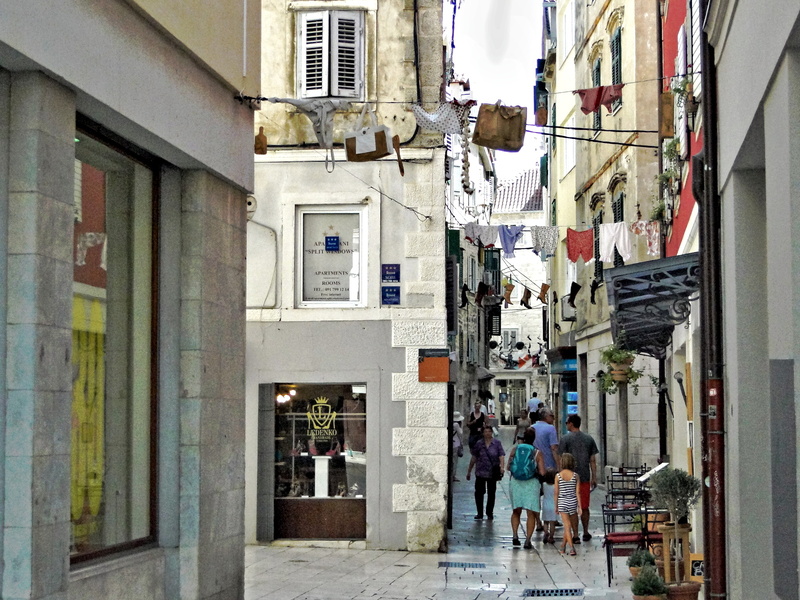 Narrow European Street with Hanging Laundry