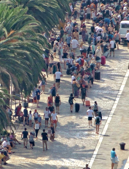A Bustling Boardwalk in a Mediterranean Town