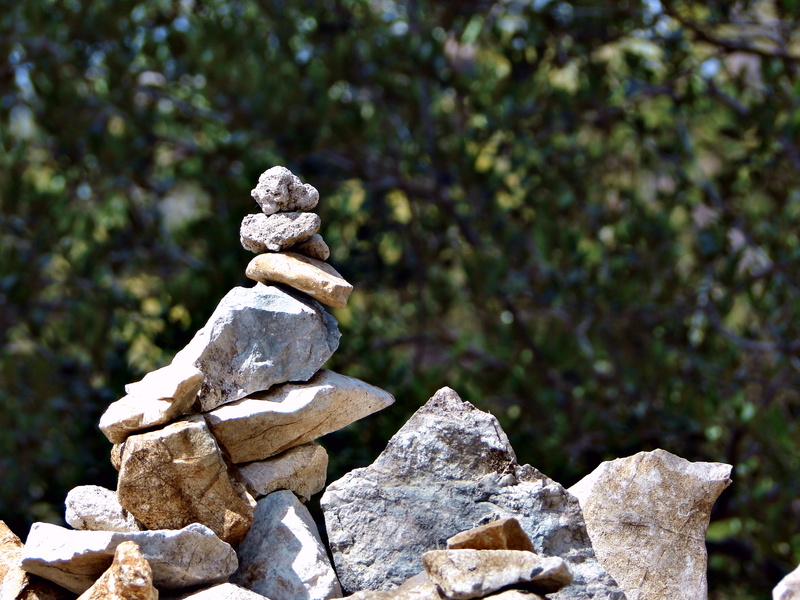 Equilibrium in Nature: A Rock Stack Balancing on Huge Rocks