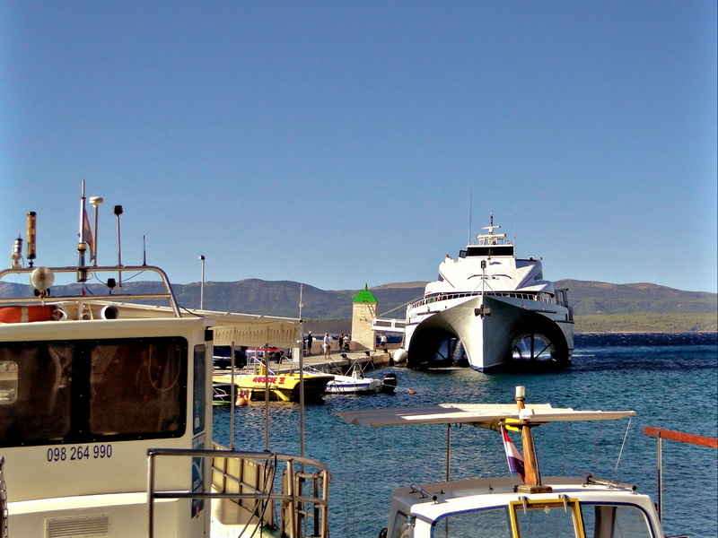Serene Harbor Scene with a White Yacht Docked