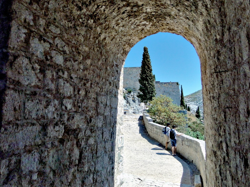 Stone Archway Overlooking a Landmark Site in Europe
