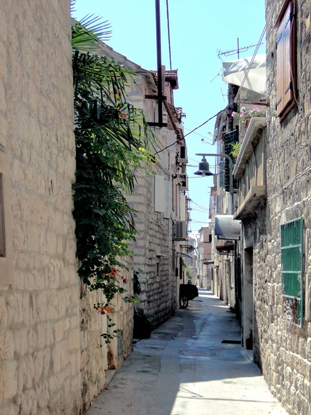 A serene alleyway in Trogir, Croatia