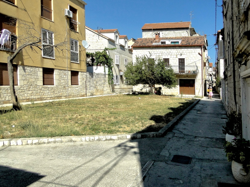 Serene Trogir Alleyway on a Sunny Day