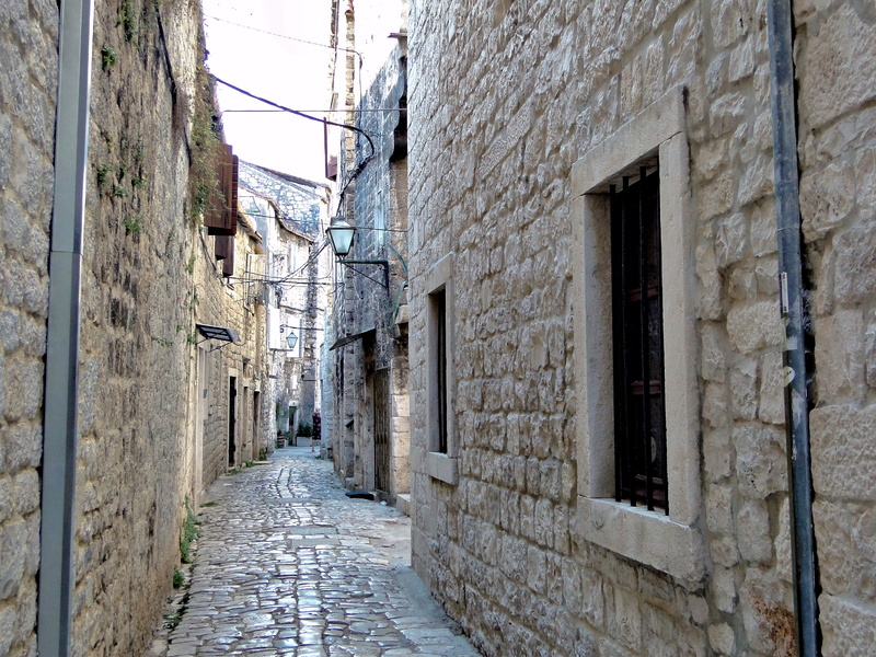 Narrow Stone Alley in a European Village