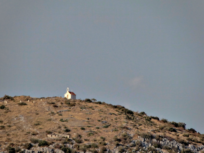 Church on a Hill Overlooking the Sea: A Serene Rural Scene