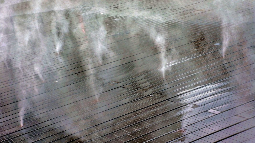 Misty Morning in Lyon: Rain Creates a Dreamlike Scene on the Street