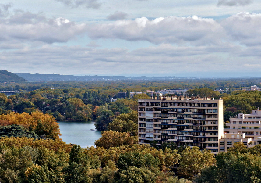 Autumnal Scene over Lyon, France - Aerial Perspective of a Residential Area by the River
