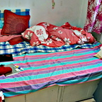 A Messy Bedroom with a Home Office in Shenyang, China