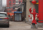 Vibrant Shenyang Street Scene with a Crab Statue and Shop