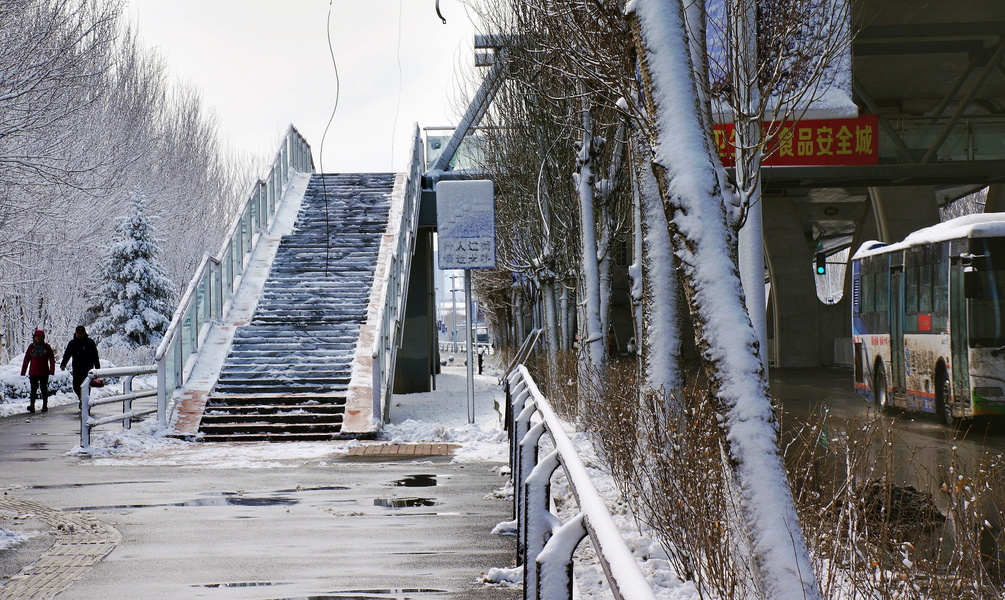 Shenyang, China: A Chilly Commute on an Icy Bus Stop Step