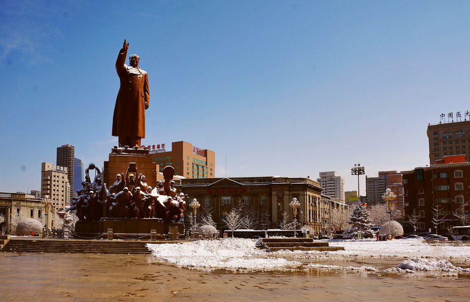 City Sculpture with Statue of a Man in the Square