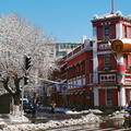 A Snowy Winter Scene in Shenyang, China with a Red Shopping Center