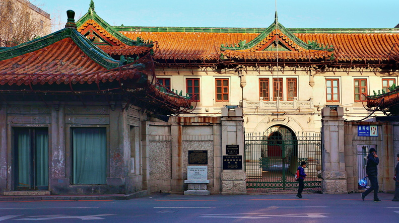 The image showcases the entrance gate of an Asian city building, likely in Shenyang, China. The architecture is characterized by traditional Chinese elements and a formal, urban setting. There's a sense of grandeur and historical significance in this public space. DSC07847.JPG