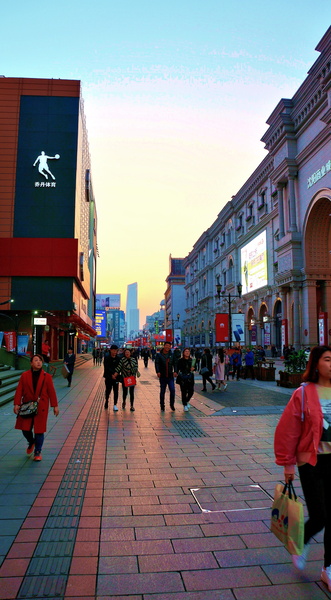 Bright and Bustling Evening Scene in a Chinese City
