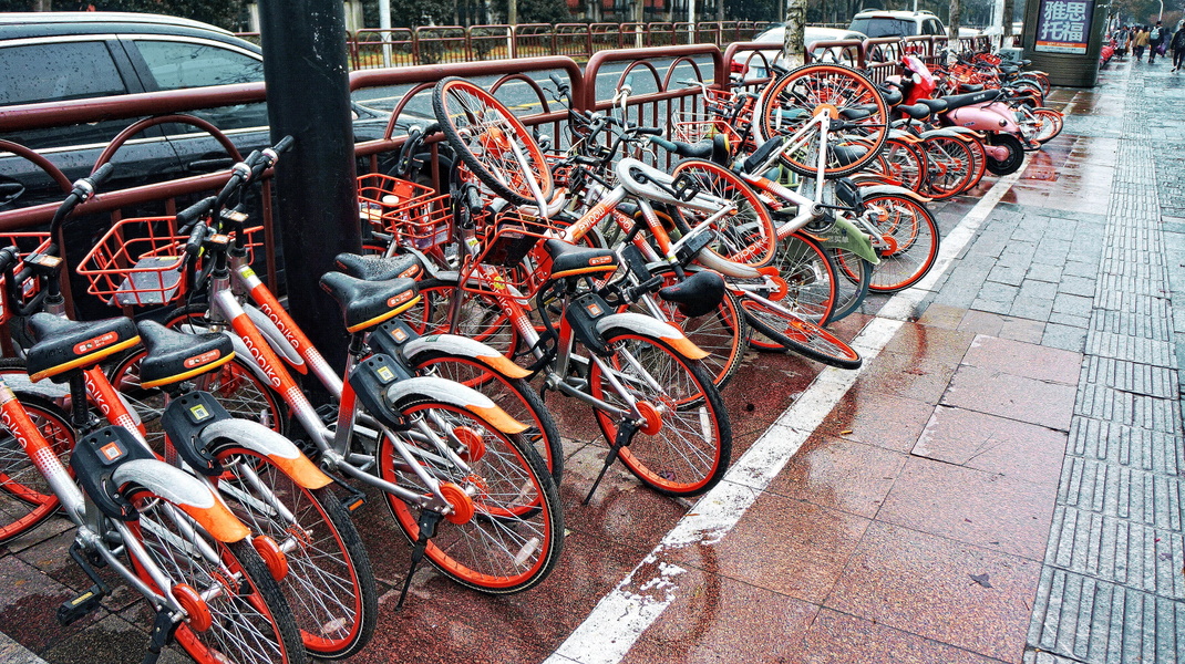 A Rainy Day in Hangzhou, China - Bikes Ready for Use