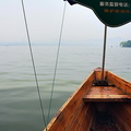 Tranquil Scene on a Chinese Lake: A Boat Ride