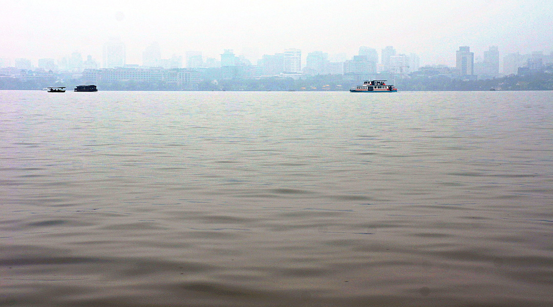 Misty Morning on the Hangzhou River, China