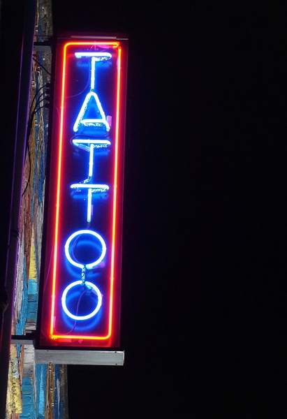 Vibrant Tattoo Shop Sign