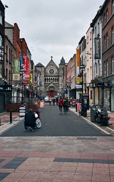 Bustling Dublin Street on a Rainy Day
