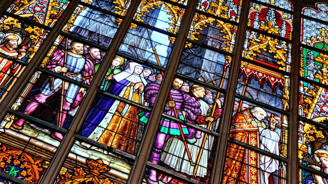 Vibrant Stained Glass Window in a Gothic Chapel