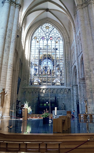 Interior of a Gothic Cathedral with Stained Glass Windows