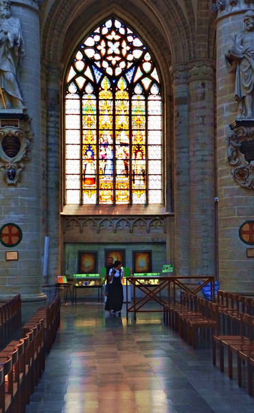 A Gothic Church Interior with Stained Glass Windows