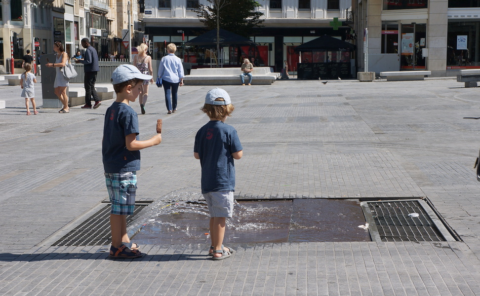 Two Children Enjoying a Day at the Park in Brussels