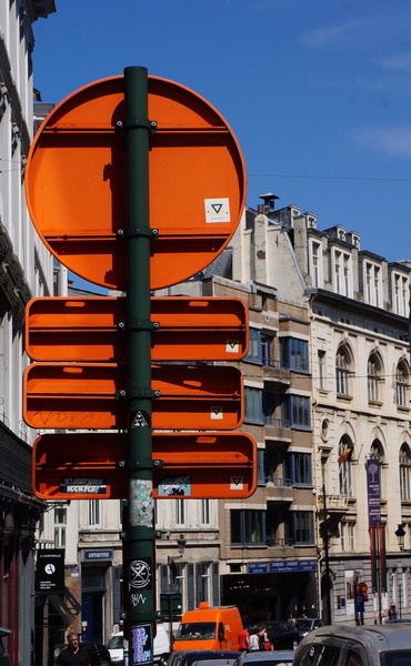 Vibrant Cityscape: Signs Pointing the Way