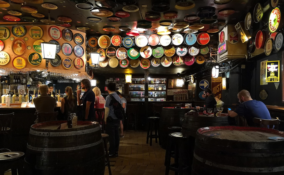 Lively Bar Interior with Colorful Signage and Advertisements