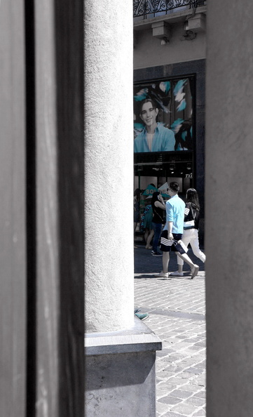 A Street Scene with People and Signage