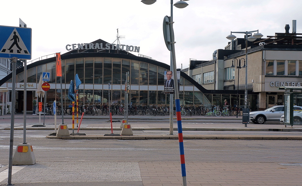 A Scene at an Urban Station or Bus Stop