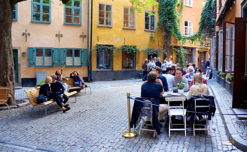 Café on a charming cobblestone street in Stockholm, Sweden