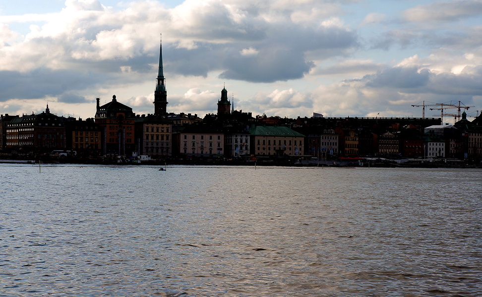 Serene Scandinavian Waterscape with Stockholm Skyline